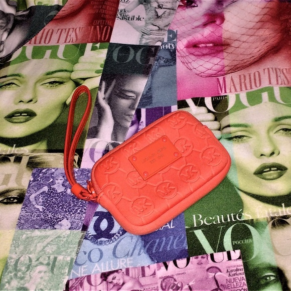 Michael Kors Handbags - Michael Kors bright orange wristlet